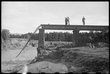 Image: Remains of the railway bridge with broken track attached, at the scene of the disaster at Tangiwai