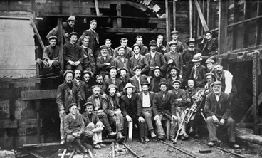 Image: The rescuers with the two rescued men, Doyle and Duggan