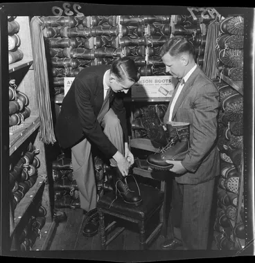 Image: Frank O'Leary of the Amazon Expedition trying on tramping boots