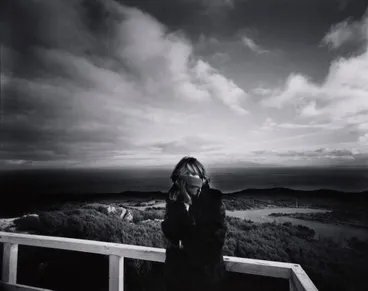 Image: Greta and the view south from Bluff Hill, Stewart Island in the distance: Bluff 1981