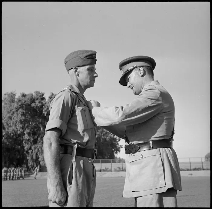 Major General Freyberg decorating Captain A E Smith at Maadi Sporting Club