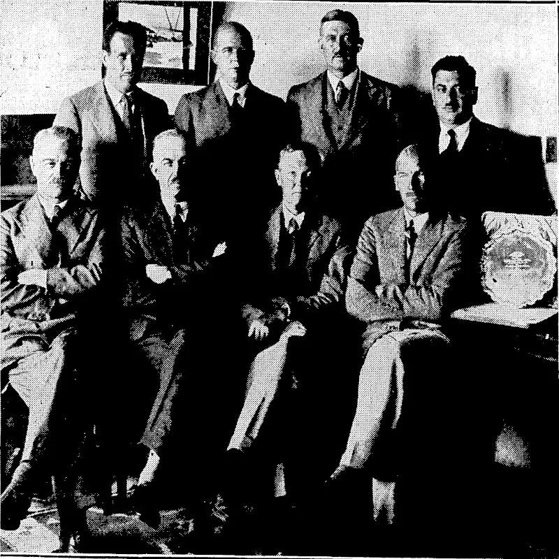 v..'-.'.■ ;, "Evening Post". Photo. , DEPARTING AIR; COMMANDER FAREWELLED:—LocaI airmen who assembled yesterday to'present tWing-Commander Grant-Dalton with a piece of silver and To farewell him on his departure for England. Front row (from left), Squadron-Leader T: M.Wilkes, Director of Air Services, Mr. A..W* Nisbet, secretary of the Wellington Aero Club', Wing-Commander.. Grant-Daltoh, Squadron-Leader G. L. ■', ■ Sledman. Back row, MessrslF. Petre,GJD.M: Goodwin, GJ, Wallace, and C^Weinstein. "■ (Evening Post, 09 January 1932)