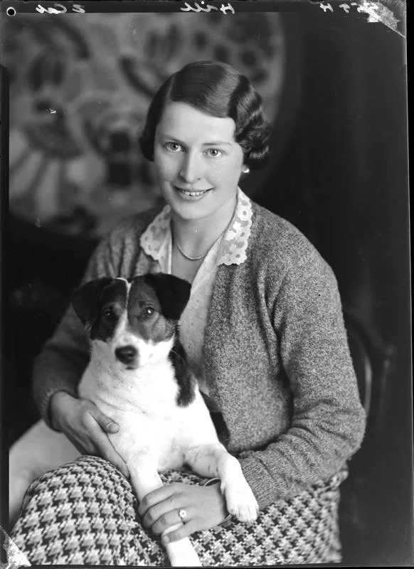 Hill, Woman and Dog.