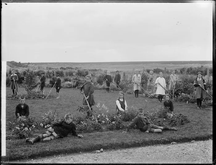 Children gardening at a school in Waianiwa
