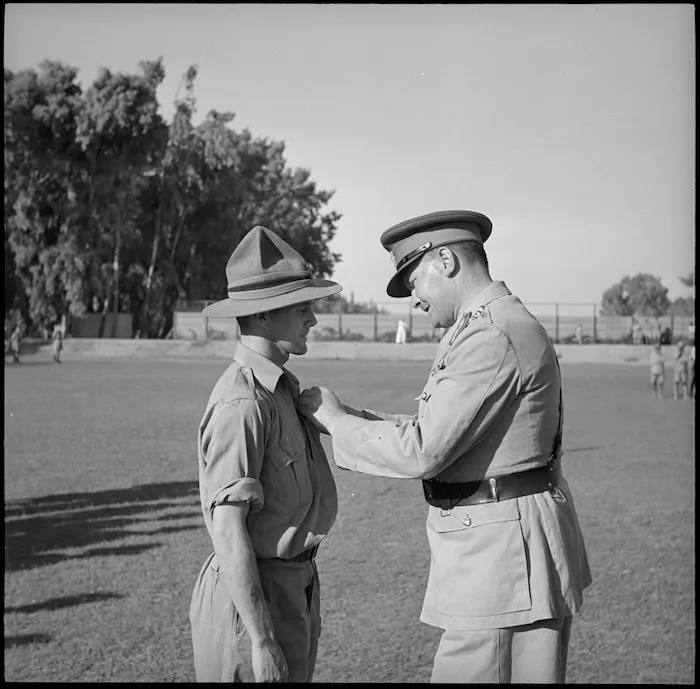 Major General Freyberg decorating Signalman Mundy at Maadi Sporting Club