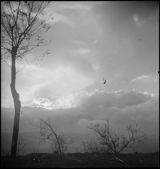 Smoke of guns combined with mountain mists over Orsogna, Italy - Photograph taken by George Kaye