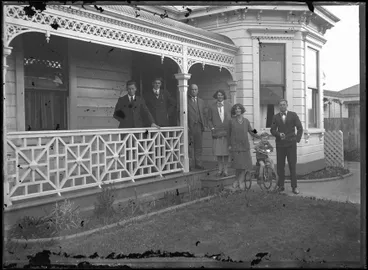 Image: Unidentified group outside villa