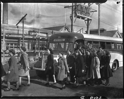 [A bus load of women factory workers]