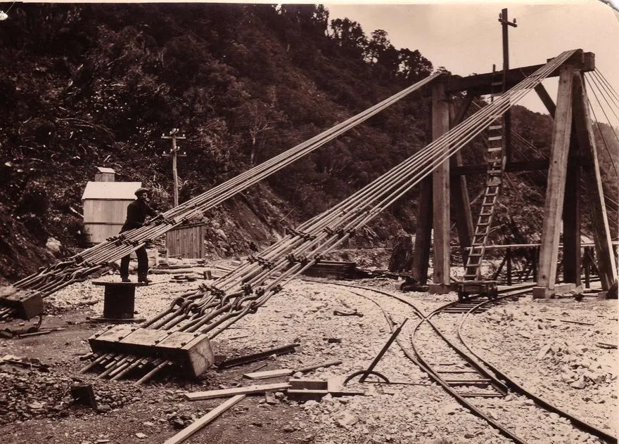 Cables anchoring suspension bridge at dam, Mangahao, 23 April 1922