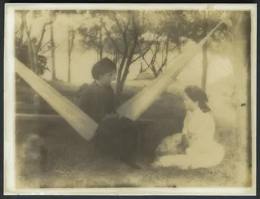 Image: [Sitting outdoors in a hammock]