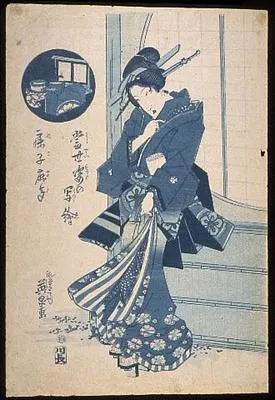 Woman standing by a window outside a house