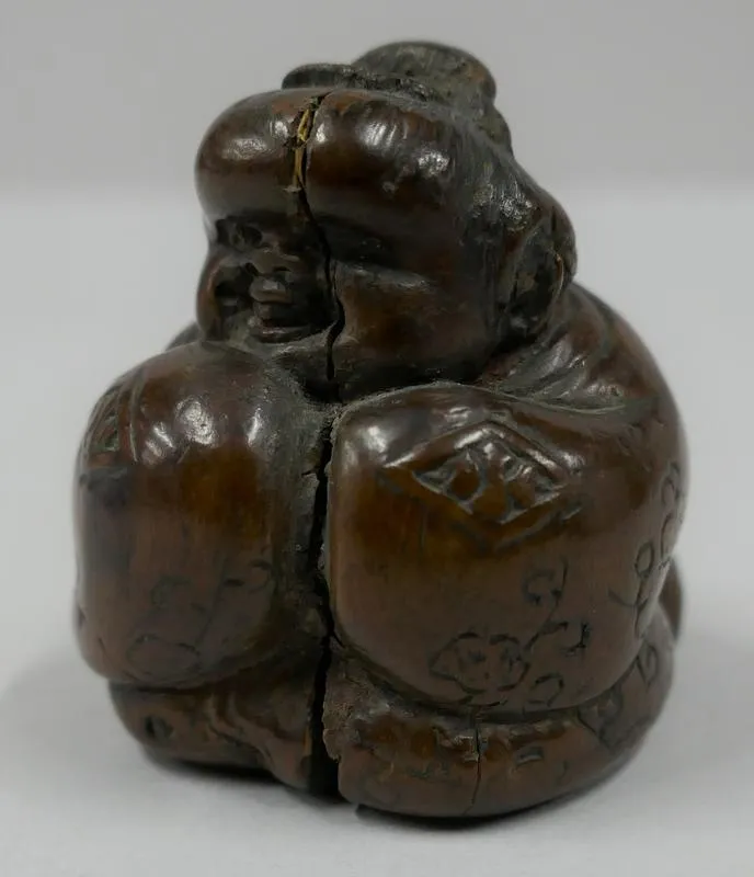 Netsuke: Okame [A plain woman]