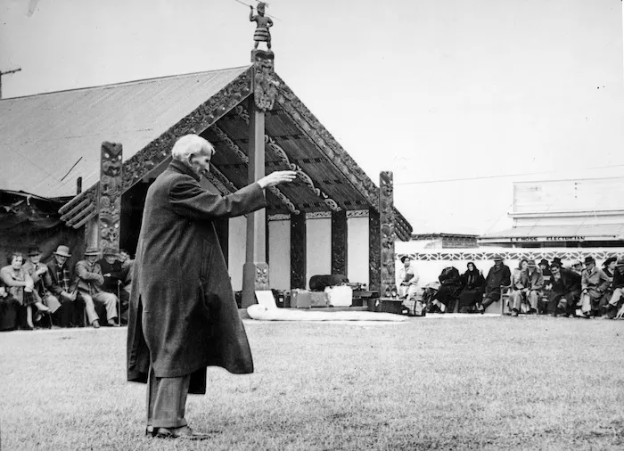 Apirana Ngata speaking outside Ngati Raukawa meeting house, Otaki