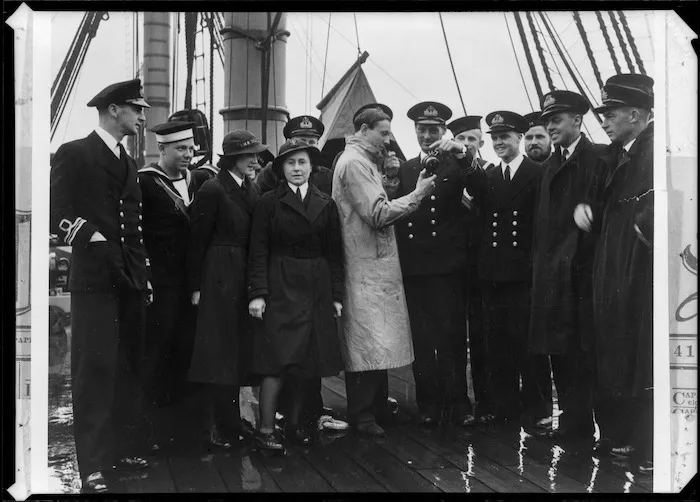 Members of the New Zealand Navy in England broadcasting messages to friends and relatives at home, during World War 2