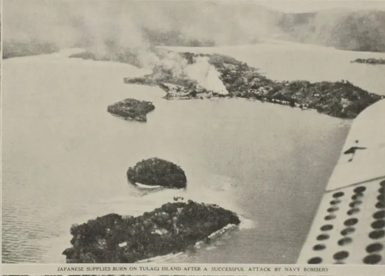 Japanese supplies burn on Tulagi Island after a successful attack by navy bombers