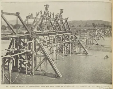 THE BRIDGE IN COURSE OF CONSTRUCTION OVER THE OPUA RIVER AT KAITERATAHI, THE TERMINUS OF THE GISBORNE RAILWAY Image: THE BRIDGE IN COURSE OF CONSTRUCTION OVER THE OPUA RIVER AT KAITERATAHI, THE TERMINUS OF THE GISBORNE RAILWAY