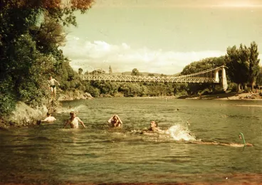 Image: Swimmers in Te Awa Kairangi / Hutt River, upstream from Maoribank suspension bridge.