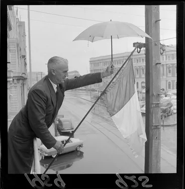 Image: Mr J F Aspell flying the Irish flag on St Patrick's Day