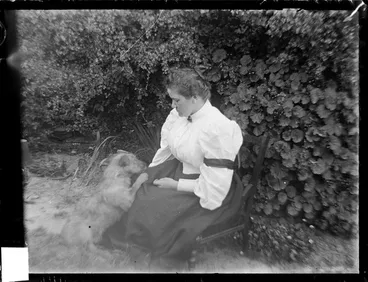 Image: Lily Kirk and dog in garden