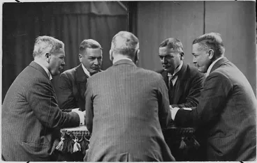 Image: Trick photograph of Alexander Horsburgh Turnbull sitting at a table