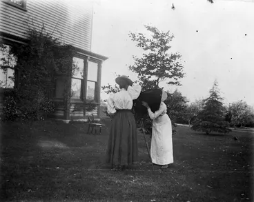 Image: Fanny Mason, with a camera set up in a garden