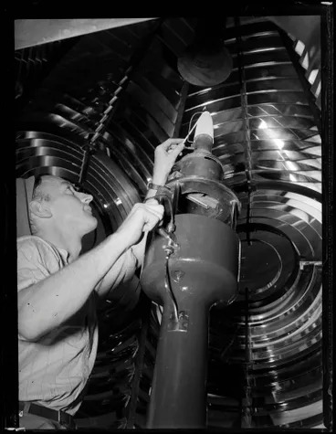 Image: Igniting the East Cape Lighthouse lamp, 1947