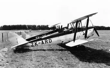 Two Tiger Moths at Hood Aerodrome : digital photograph Image: Two Tiger Moths at Hood Aerodrome : digital photograph