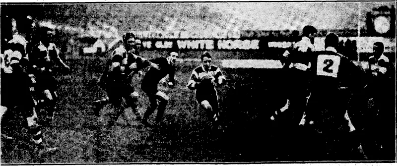 Evening Post" Photo. FLIGHT – LIEUTENANT G. B. BOLT, appointed assistant instructor ••• and ground ; engineer to/ the Wellington Aero Club. . 1 ' ' -Sydney Morning Herald" Photo. NEW ZEALAND UNIVERSITY DEFEATS NEW ■ SOUTH 'WALES. -—Forwards reachingfor the ball during ihe match between New South) Wales and the New Zealand,University team at University Oval, ; Sydney, last Wednesday. The visitors won by 28 to 10. ■_■■■ AN INCIDENT IN THE PONEkE-HUTT SENIOR A GRADE RUGBY^ AFTERNOON.r—SadIer, the Him-half-back, starting an attack with Ball in support. M to check the movement. ' Ihitt were defeated for the first- time this[season,' Poneke ivinningbyi 16 points to 6. . .' . . . ' ' (Evening Post, 15 June 1931)