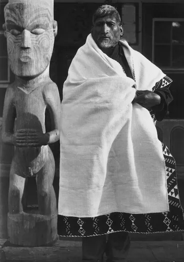 Image: Poutauma modeling a kaitaka fine flax cloak decorated with taniko, at Koriniti