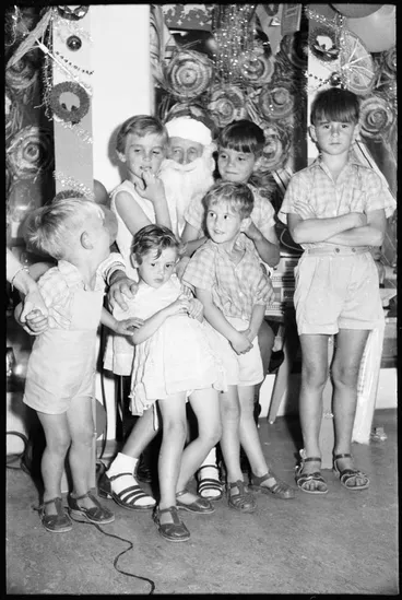 Children sitting on Santa's knee, 1959 Image: Children sitting on Santa's knee, 1959