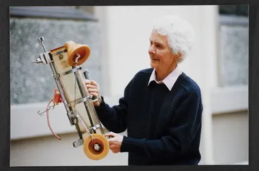 Image: Dr Vida Mary Stout with scientific instrument