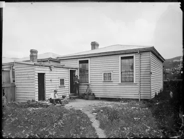 Image: Cottage in Clayton's Avenue, Wellington, and men alongside