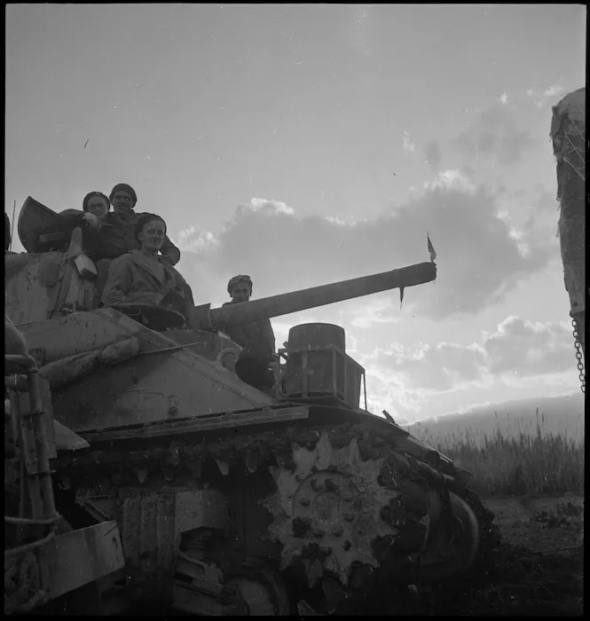 Men of NZ tank formation move towards the bridge across the Sangro in Italy, World War II - Photograph taken by George Kaye