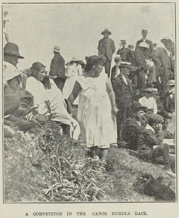 Image: A competitor in the canoe hurdle race