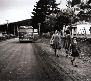 Image: They hear the school bus stop on the road. From the series: Washday at the pa