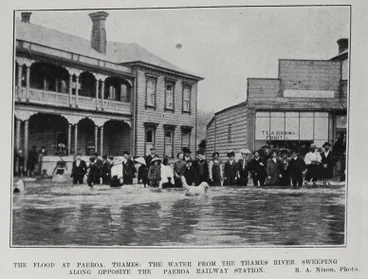 Image: THE FLOOD AT PAEROA, THAMES: THE WATER FROM THE THAMES RIVER SWEEPING ALONG OPPOSITE THE PAEROA RAILWAY STATION