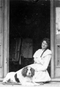 Arabella Welch with a dog : Photograph