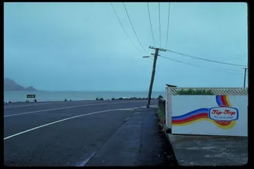 Image: [Tip-Top billboard on the coast].