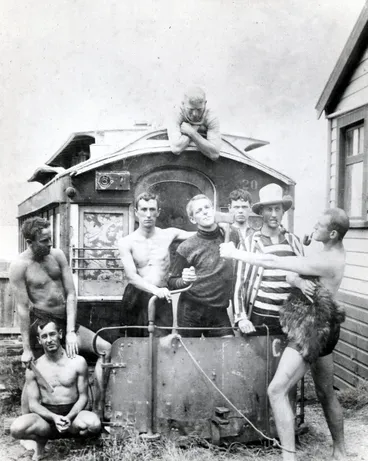 Image: Men with disused steam tram