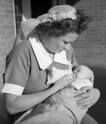 Image: Karitane nurse bottle feeding a baby