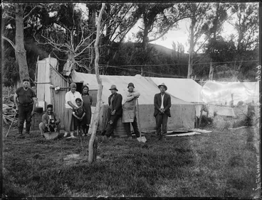 Image: People standing outside a dwelling, Fernhill