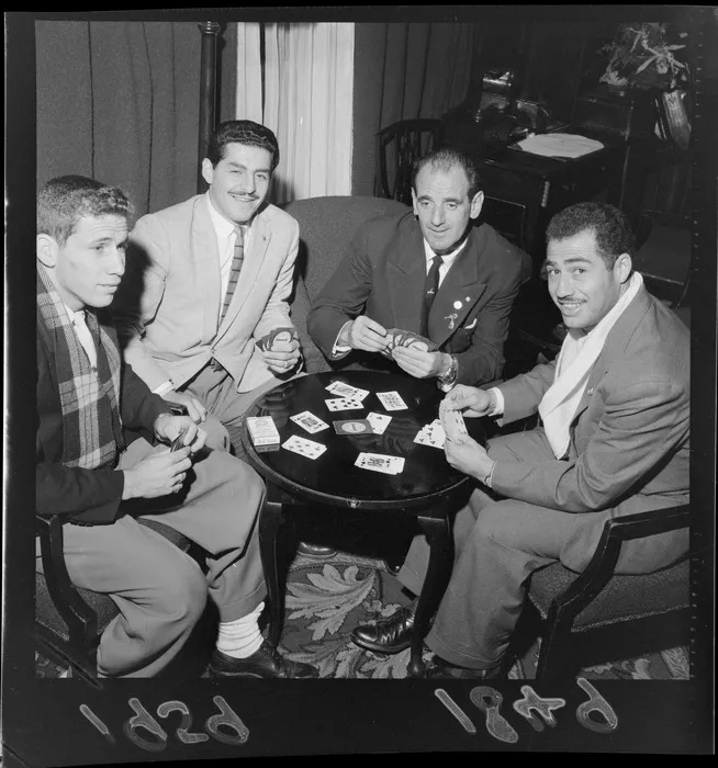 Costa Rican Soccer players playing cards at their hotel