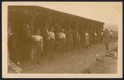 [Servicemen with stabled horses]
