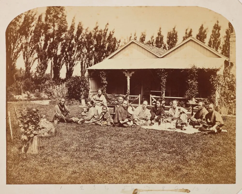Group of Japanese people on lawn. From the album: Travel album