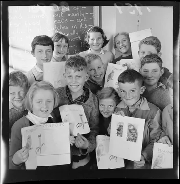 Image: Schoolchildren with drawings and stories about a morepork, Korokoro School, Wellington