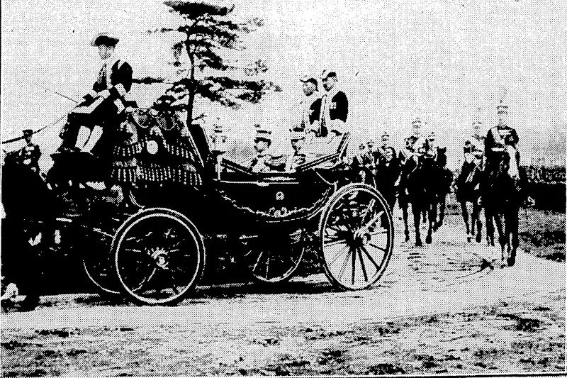 TWO EMPERORS AT TOKIO.—The Emperor of Japan and the Emperor of Manchukuo (nearest camera) on their way to a recent review of Japanese troops at Tokio. The Emperor of Manchukuo arrived at Yokohama on April 5, later going on to Tokio. All through the period of his visit he was closely guarded by police and soldiers. . • ' ' ' (Evening Post, 04 July 1935)