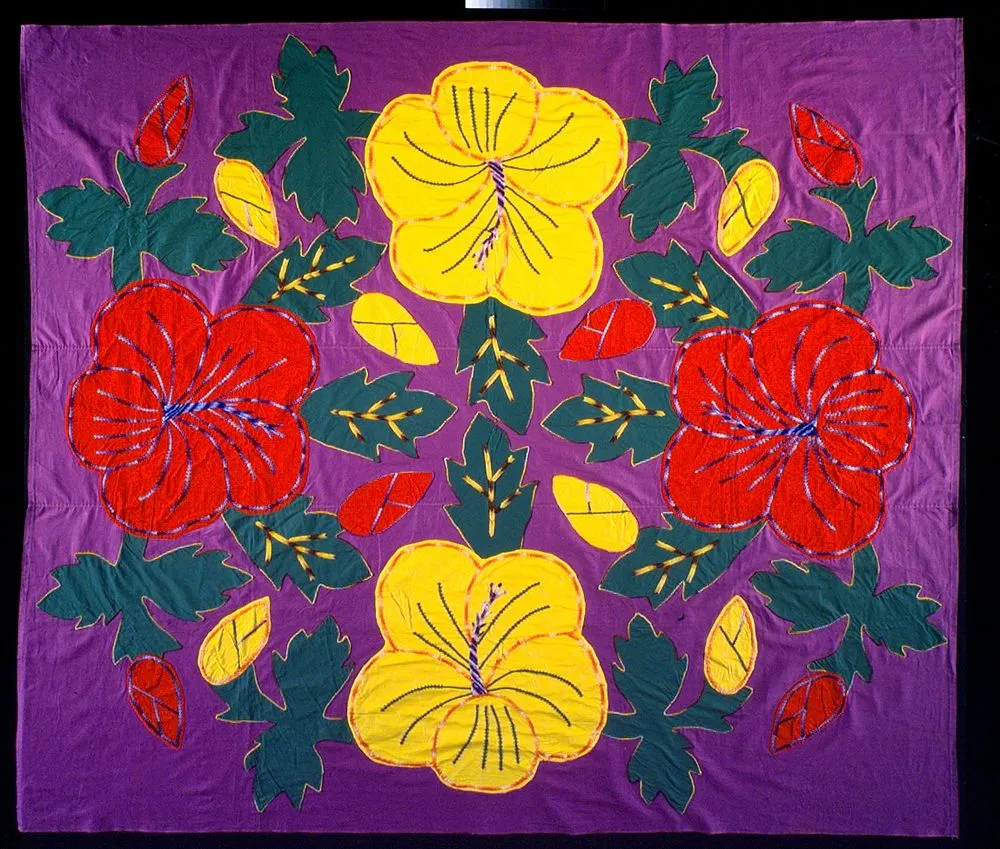 Tivaevae tataura (embroidered quilt) and pillow cases