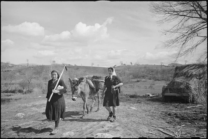 Italian peasants carry out their pursuits close to the 2 New Zealand Division on the Italian Front, World War II - Photograph taken by George Kaye