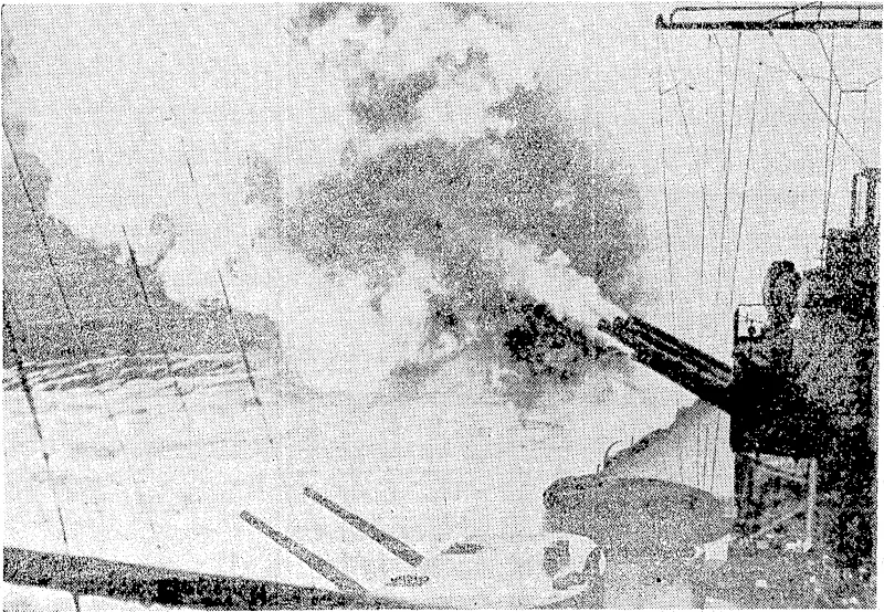 The 14' in guns of a United States battleship in action against Japanese positions in the Aleutians, (Evening Post, 17 September 1943)