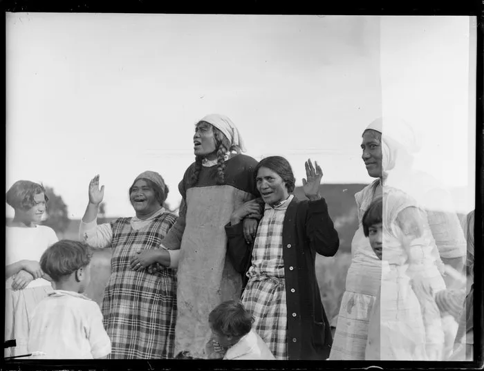 Group of wāhine singing waiata, Korohe marae